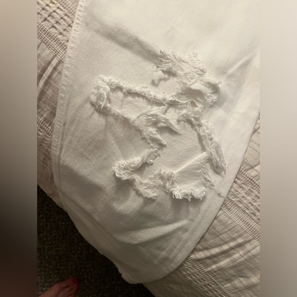 Sz 28 agolde white jeans with holes in knees - Picture 2 of 9